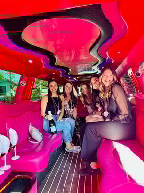 Pink limo rental birthday celebration